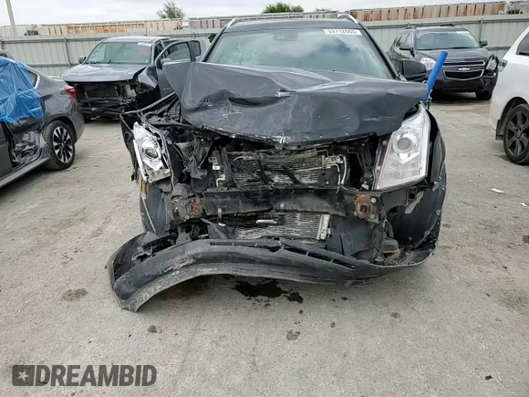 2015 Cadillac SRX Performance Collection with VIN 3GYFNFE32FS605151, listed as a Copart auction lot 53712665 with Not provided miles and Salvage title. Bid and sale history available at DreamBid. Image 12.