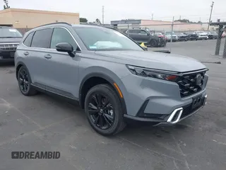 2025 Honda CR-V Sport Touring with VIN 2HKRS6H99SH811809, listed as a IAAI auction lot 41219485 with 1,387 mi miles and . Bid and sale history available at DreamBid. Image 1.