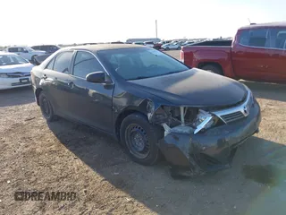 2014 Toyota Camry L with VIN 4T4BF1FK9ER363906, listed as a IAAI auction lot 41850751 with 207,368 mi miles and . Bid and sale history available at DreamBid. Image 1.