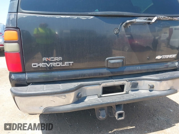 2004 Chevrolet Tahoe LS with VIN 1GNEC13T04R156427, listed as a IAAI auction lot 42333312 with 303,040 mi miles and . Bid and sale history available at DreamBid. Image 12.