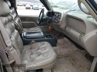 1999 GMC Suburban with VIN 1GDFK16R9XJ771458, listed as a Copart auction lot 43412175 with 159,328 mi miles and Salvage Title. Bid and sale history available at carsss.com. Image 7.
