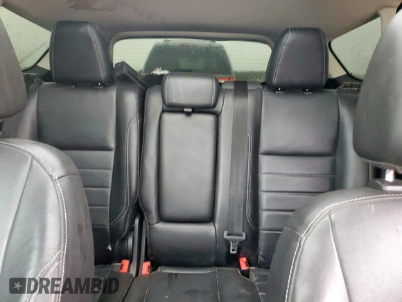 2014 Ford Escape Titanium с VIN 1FMCU0J90EUA04690, выставлен на аукционе Copart как лот 58421735 с пробегом 200 743 миль миль и Чистый • Clean title. История ставок и продаж доступна на DreamBid. Изображение 10.
