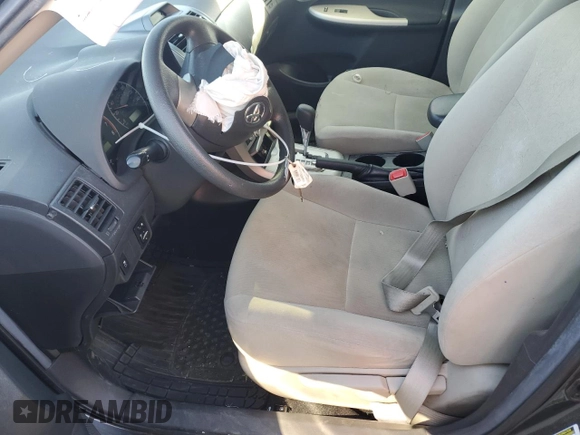 2013 Toyota Corolla L with VIN 2T1BU4EE5DC111728, listed as a Copart auction lot 77217394 with Not Provided miles and Salvage Title. Bid and sale history available at DreamBid. Image 7.
