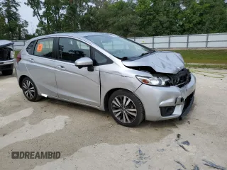 2016 Honda Fit EX with VIN JHMGK5H78GX013005, listed as a Copart auction lot 58396115 with 157,342 mi miles and Salvage title. Bid and sale history available at DreamBid. Image 4.