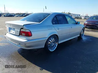 2003 BMW 5 Series 525i with VIN WBADT33473GF43821, listed as a IAAI auction lot 41450822 with 165,062 mi miles. Bid and sale history available at carsss.com. Image 4.