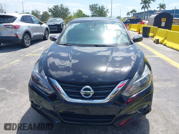 2016 Nissan Altima SR with VIN 1N4AL3AP4GC289147, listed as a IAAI auction lot 42159067 with 105,112 mi miles and . Bid and sale history available at carsss.com. Image 6.