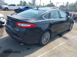 2013 Ford Fusion Titanium Hybrid with VIN 3FA6P0RU7DR355481, listed as a IAAI auction lot 41814003 with 177,789 mi miles. Bid and sale history available at carsss.com. Image 4.