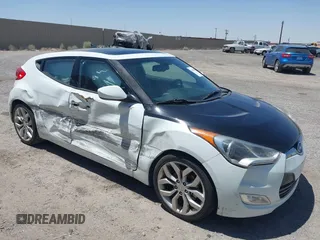 2014 Hyundai Veloster RE:FLEX with VIN KMHTC6AD7EU214911, listed as a IAAI auction lot 42617066 with 115,521 mi miles and . Bid and sale history available at DreamBid. Image 1.
