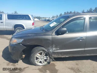 2012 Hyundai Santa Fe GLS with VIN 5XYZGDAB5CG126900, listed as a IAAI auction lot 41781584 with 124,897 mi miles. Bid and sale history available at carsss.com. Image 6.