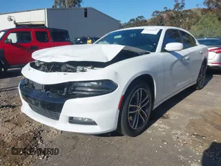 2019 Dodge Charger SXT with VIN 2C3CDXJGXKH533322, listed as a IAAI auction lot 41808838 with 95,877 mi miles and . Bid and sale history available at DreamBid. Image 2.