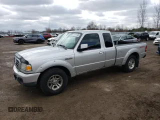 2009 Ford Ranger XLT with VIN 1FTYR44E79PA62392, listed as a Copart auction lot 52671135 with 239,992 mi miles and Clean title. Bid and sale history available at DreamBid. Image 1.