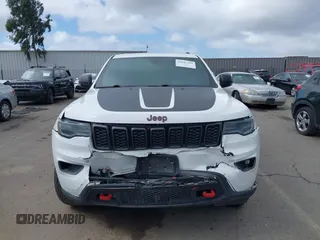 2018 Jeep Grand Cherokee Trailhawk with VIN 1C4RJFLT2JC137793, listed as a IAAI auction lot 41697299 with 149,100 mi miles and . Bid and sale history available at DreamBid. Image 6.