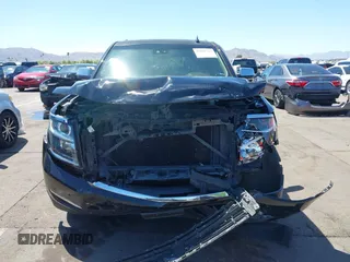 2015 Chevrolet Tahoe LTZ z VIN 1GNSKCKC7FR715512, wystawiony jako IAAI lot #42054583 z przebiegiem 106 941 mil mil oraz . Historia ofert i sprzedaży dostępna na DreamBid. Obrazek 6.