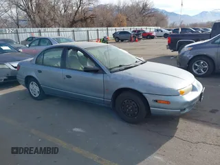 2002 Saturn SL z VIN 1G8ZS52802Z252972, wystawiony jako IAAI lot #41094484 z przebiegiem 341 794 mil mil oraz . Historia ofert i sprzedaży dostępna na DreamBid. Obrazek 1.