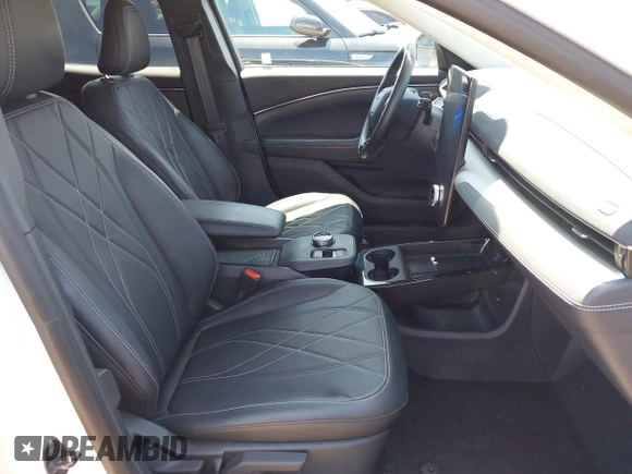 2021 Ford Mustang Mach-E Select z VIN 3FMTK1RM1MMA49774, wystawiony jako IAAI lot #42462914 z przebiegiem 16 754 mil mil oraz . Historia ofert i sprzedaży dostępna na DreamBid. Obrazek 5.