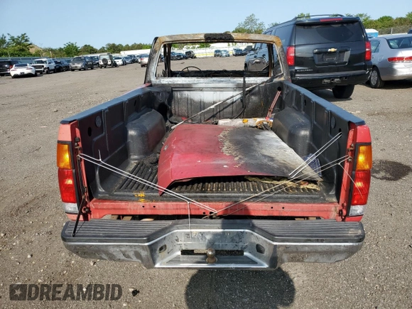 1995 Nissan Frontier с VIN 1N6SD11S1SC430802, выставлен на аукционе Copart как лот 58737355 с пробегом Не указан миль и Списание • Salvage title. История ставок и продаж доступна на DreamBid. Изображение 6.