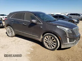 2017 Cadillac XT5 Platinum AWD z VIN 1GYKNFRS6HZ138810, wystawiony jako Copart lot #48029455 z przebiegiem 97 948 mil mil oraz Szkoda całkowita • Salvage title. Historia ofert i sprzedaży dostępna na DreamBid. Obrazek 4.