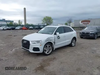 2017 Audi Q3 Premium z VIN WA1ECCFS7HR007729, wystawiony jako IAAI lot #42066580 z przebiegiem 116 460 mil mil oraz . Historia ofert i sprzedaży dostępna na DreamBid. Obrazek 17.