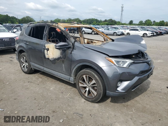 2018 Toyota RAV4 XLE with VIN JTMWFREV2JD125190, listed as a Copart auction lot 60484965 with Not provided miles and Salvage title. Bid and sale history available at DreamBid. Image 4.