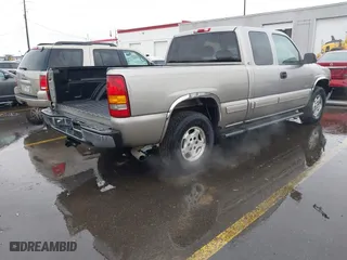 1999 Chevrolet Silverado 1500 LT with VIN 2GCEK19T1X1195916, listed as a IAAI auction lot 41740193 with 111,263 mi miles. Bid and sale history available at carsss.com. Image 4.