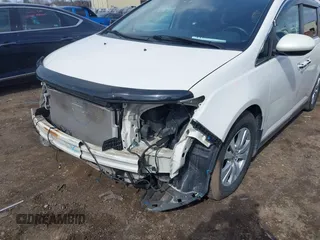 2014 Honda Odyssey EX-L with VIN 5FNRL5H63EB136541, listed as a IAAI auction lot 41866320 with 148,696 mi miles and . Bid and sale history available at DreamBid. Image 6.