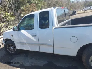 2002 Ford F-150 XL with VIN 1FTRX17L32NA13159, listed as a IAAI auction lot 41653814 with 435,395 mi miles. Bid and sale history available at carsss.com. Image 14.