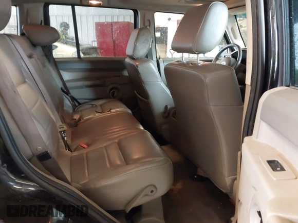 2006 Jeep Commander z VIN 1J8HG48K36C268732, wystawiony jako IAAI lot #42285260 z przebiegiem 215 512 mil mil oraz . Historia ofert i sprzedaży dostępna na DreamBid. Obrazek 8.