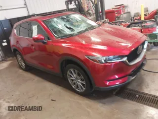 2020 Mazda CX-5 Grand Touring with VIN JM3KFBDMXL0840847, listed as a IAAI auction lot 41732185 with 36,248 mi miles. Bid and sale history available at carsss.com. Image 1.