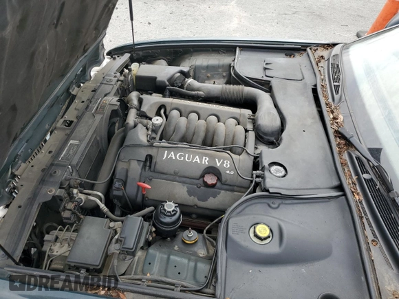 1999 Jaguar XJ with VIN SAJHX1044XC865054, listed as a Copart auction lot 57825325 with 71,145 mi miles and Clean title. Bid and sale history available at DreamBid. Image 11.