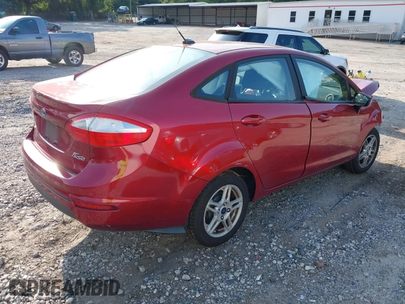 2017 Ford Fiesta SE with VIN 3FADP4BJ1HM110452, listed as a IAAI auction lot 39782919 with 199,370 mi miles and . Bid and sale history available at DreamBid. Image 4.