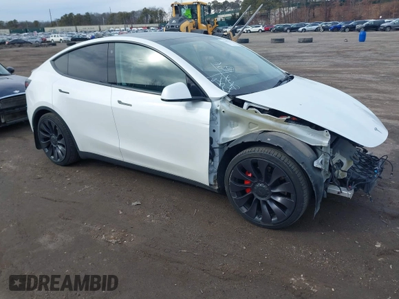 2021 Tesla Model Y Performance with VIN 5YJYGDEF1MF262930, listed as a IAAI auction lot 41606321 with 28,882 mi miles and . Bid and sale history available at DreamBid. Image 1.