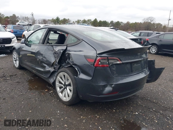 2022 Tesla Model 3 with VIN 5YJ3E1EA6NF143839, listed as a IAAI auction lot 40905007 with 83,897 mi miles and . Bid and sale history available at DreamBid. Image 3.