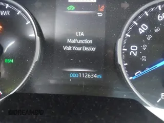 2020 Toyota RAV4 Hybrid XLE with VIN 2T3RWRFV5LW058103, listed as a IAAI auction lot 42665299 with 112,634 mi miles and . Bid and sale history available at DreamBid. Image 16.