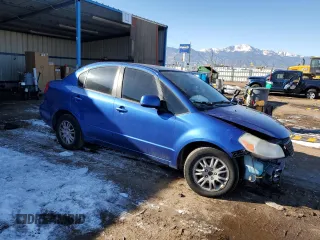 2013 Suzuki SX4 LE with VIN JS2YC5A38D6101442, listed as a Copart auction lot 42833395 with 154,379 mi miles and Salvage Title. Bid and sale history available at carsss.com. Image 4.