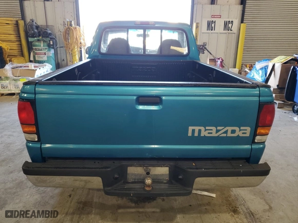 1996 Mazda B-Series 2WD Truck with VIN 4F4CR12A2TTM30539, listed as a Copart auction lot 82702234 with 115,724 mi miles and Salvage Title. Bid and sale history available at carsss.com. Image 6.