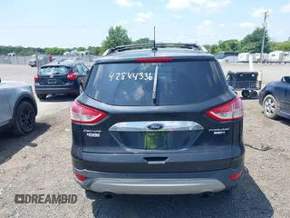 2015 Ford Escape Titanium with VIN 1FMCU9J96FUC01790, listed as a IAAI auction lot 42844336 with 133,005 mi miles and . Bid and sale history available at DreamBid. Image 16.