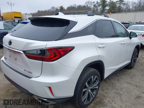 2018 Lexus RX 350 with VIN 2T2BZMCA7JC144576, listed as a IAAI auction lot 41811166 with 127,548 mi miles and . Bid and sale history available at DreamBid. Image 4.