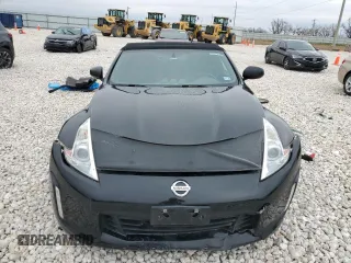 2014 Nissan 370Z Touring with VIN JN1AZ4FH1EM620177, listed as a Copart auction lot 42581255 with 106,957 mi miles and Salvage Title. Bid and sale history available at DreamBid. Image 5.