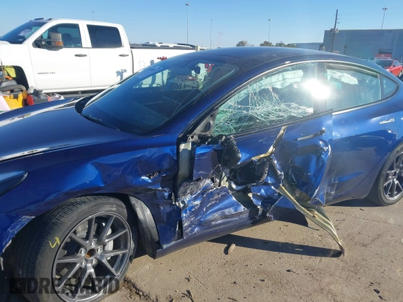 2023 Tesla Model 3 with VIN 5YJ3E1EA6PF505252, listed as a IAAI auction lot 41380172 with 31,141 mi miles and . Bid and sale history available at DreamBid. Image 6.