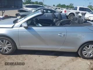 2009 Volkswagen Eos Komfort with VIN WVWBA71F39V020521, listed as a IAAI auction lot 42004648 with 50,885 mi miles and . Bid and sale history available at DreamBid. Image 14.