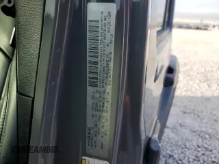 2020 Jeep Wrangler Unlimited Sahara Altitude with VIN 1C4HJXEG2LW206453, listed as a Copart auction lot 82303434 with 51,559 mi miles and Salvage title. Bid and sale history available at DreamBid. Image 12.