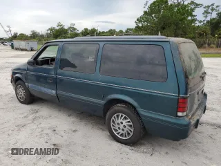 1995 Dodge Caravan Grand SE z VIN 1B4GH44R8SX633988, wystawiony jako Copart lot #65667454 z przebiegiem 121 183 mil mil oraz Tytuł czysty. Historia ofert i sprzedaży dostępna na DreamBid. Obrazek 2.