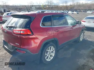 2014 Jeep Cherokee Latitude z VIN 1C4PJMCSXEW141453, wystawiony jako IAAI lot #41975311 z przebiegiem 150 085 mil mil oraz . Historia ofert i sprzedaży dostępna na DreamBid. Obrazek 4.
