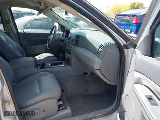 2005 Jeep Grand Cherokee Laredo with VIN 1J4GR48K15C542354, listed as a IAAI auction lot 41940355 with 158,065 mi miles. Bid and sale history available at carsss.com. Image 5.