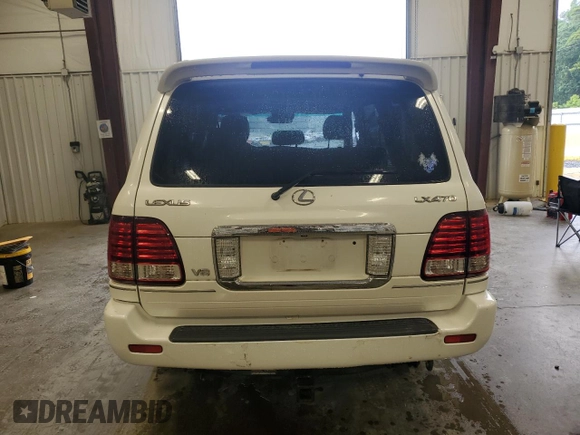 2006 Lexus LX 470 z VIN JTJHT00W464009295, wystawiony jako Copart lot #56724525 z przebiegiem 155 874 mil mil oraz Szkoda całkowita • Salvage title. Historia ofert i sprzedaży dostępna na DreamBid. Obrazek 6.