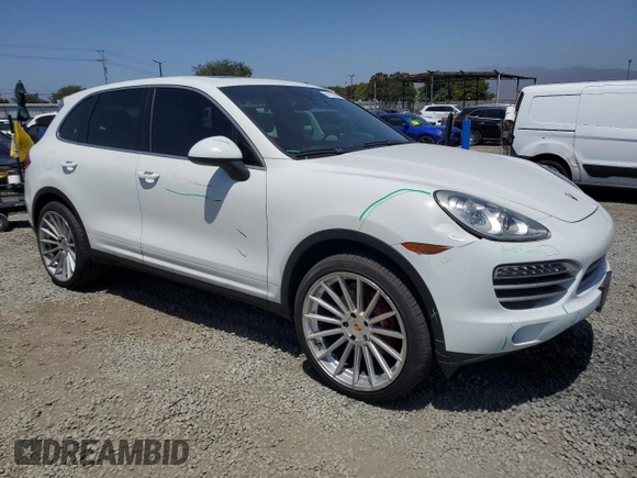 2014 Porsche Cayenne with VIN WP1AA2A28ELA09742, listed as a Copart auction lot 61779285 with 182,380 mi miles and Salvage title. Bid and sale history available at DreamBid. Image 4.