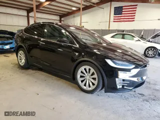 2018 Tesla Model X 75D with VIN 5YJXCAE29JF111980, listed as a Copart auction lot 51465695 with 0 mi miles and Salvage Title. Bid and sale history available at carsss.com. Image 4.