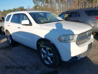 2012 Dodge Durango Crew with VIN 1C4SDJDT1CC163492, listed as a IAAI auction lot 41327149 with 253,076 mi miles and . Bid and sale history available at carsss.com. Image 1.