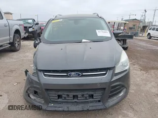 2016 Ford Escape Titanium with VIN 1FMCU0J9XGUC58149, listed as a IAAI auction lot 41739005 with 111,594 mi miles. Bid and sale history available at carsss.com. Image 11.