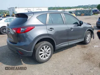 2016 Mazda CX-5 Sport with VIN JM3KE4BY7G0893984, listed as a IAAI auction lot 42479813 with Not provided miles and . Bid and sale history available at DreamBid. Image 4.